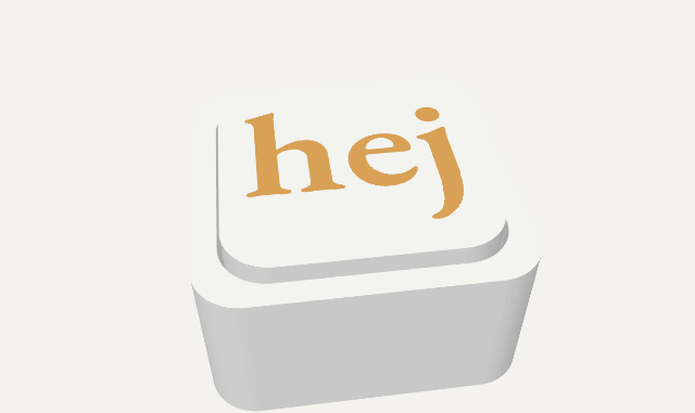 Clicker keychain with a pressable key showing the Hej logo